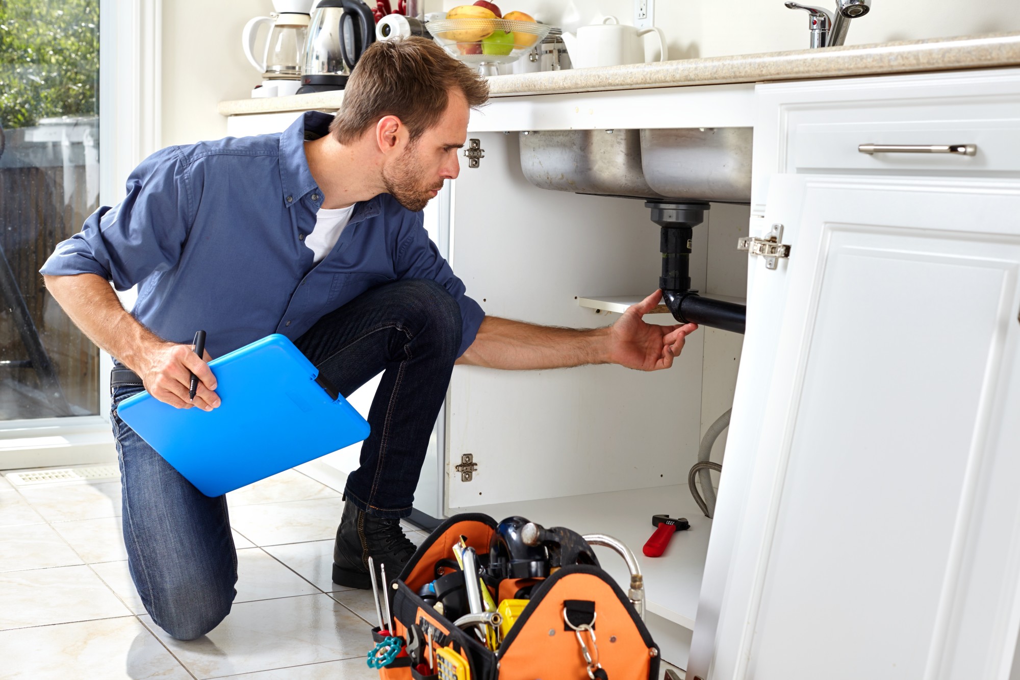 Battling Hairballs and Food Scraps: When to Call a Plumber for a Clogged Sink Drain