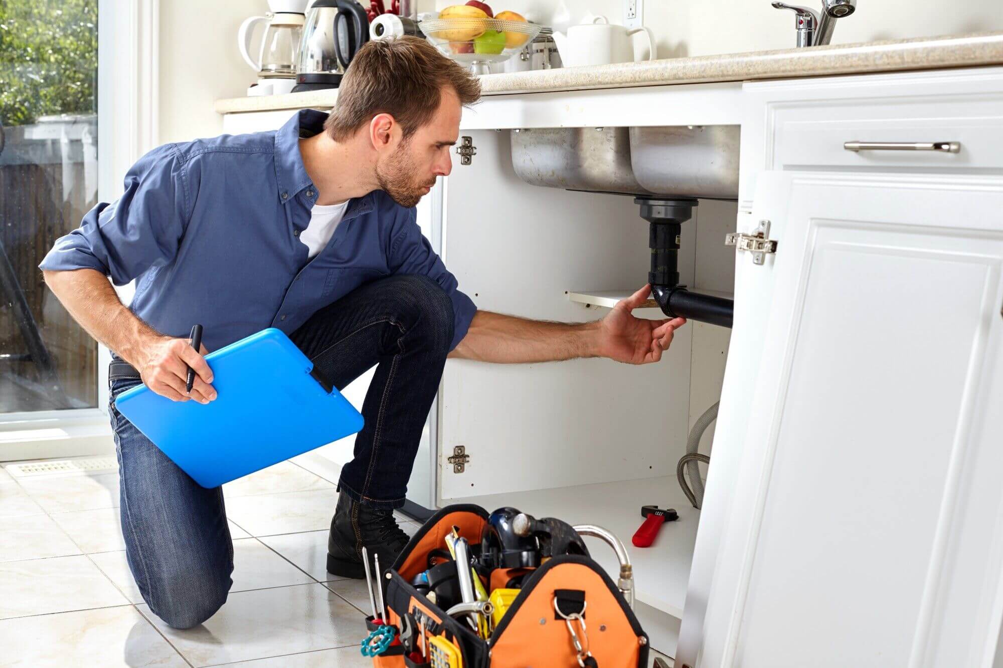 Battling Hairballs and Food Scraps: When to Call a Plumber for a Clogged Sink Drain